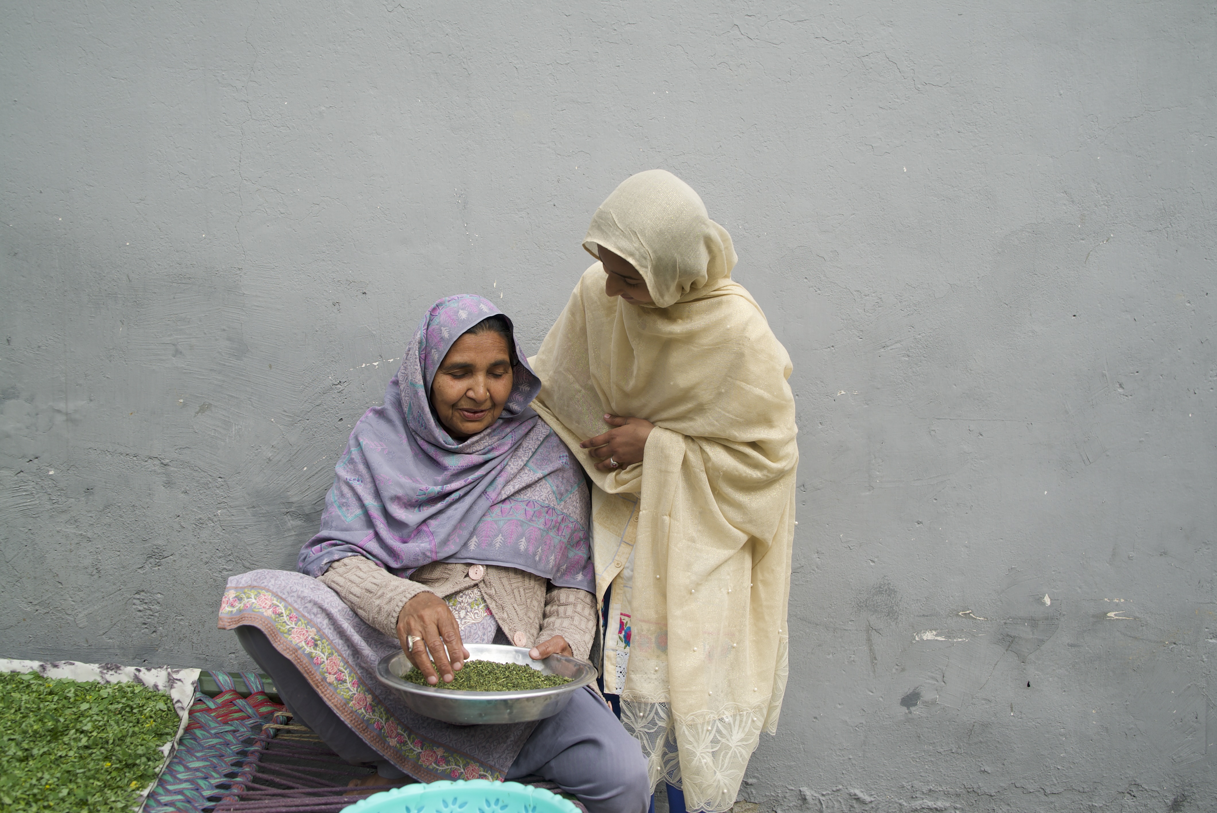 An orphan and her guardian at home